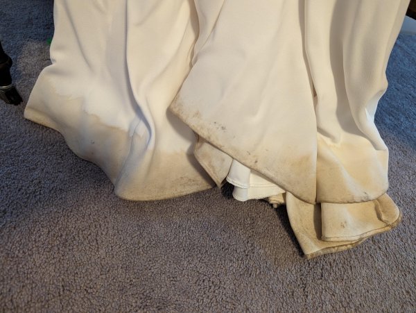 Help! How do I clean the bottom of my wedding dres..