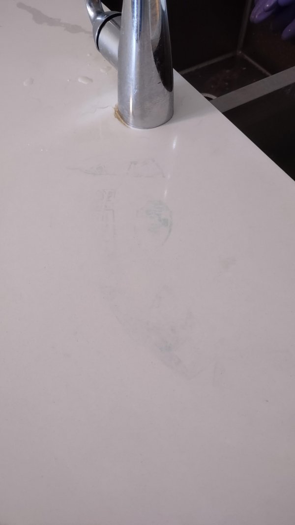 How to clean these marks off countertops?    I use..